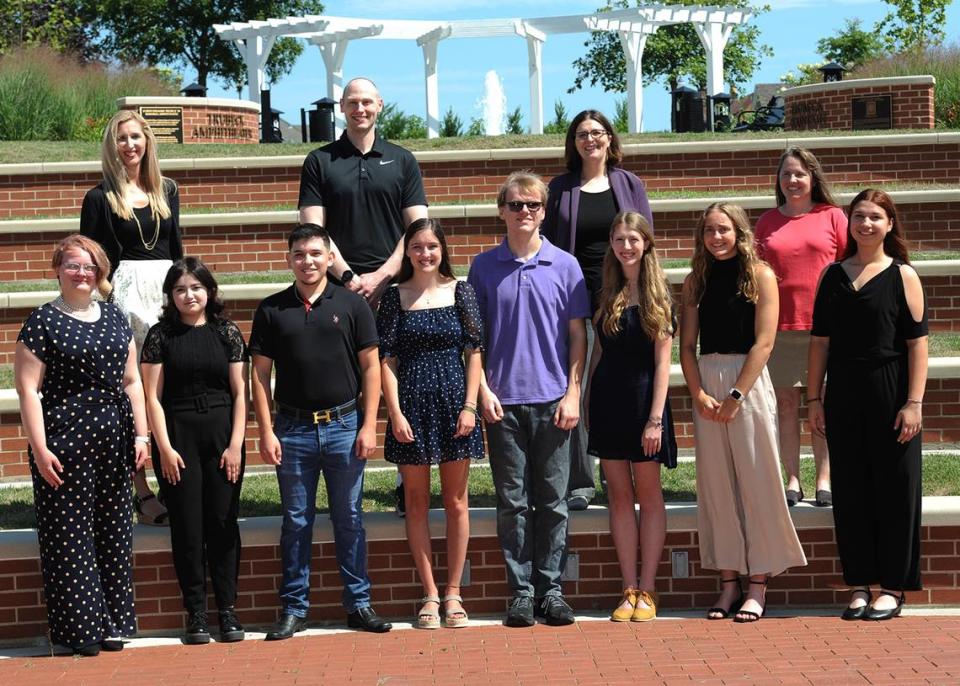 Pictured from left in the front row are Kieft summer research students Ivy Hawkins, Cassandra Nolasco, Alejandro Arteaga, Julia Bean, Riley Kalnins, Hannah McGhee, Elizabeth Schmidt and Lina Jursa. In back are, from left, are the faculty members overseeing this year’s program: Audra Goach, Michael Prinsell, Janet Ugolino and Laura Moore.