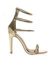 <p>Public Desire Nikki Strappy Stilettos in Gold, $43, <a href="http://www.polyvore.com/cgi/img-thing?.out=jpg&size=l&tid=149499331" rel="nofollow noopener" target="_blank" data-ylk="slk:publicdesire.com;elm:context_link;itc:0;sec:content-canvas" class="link ">publicdesire.com</a></p>