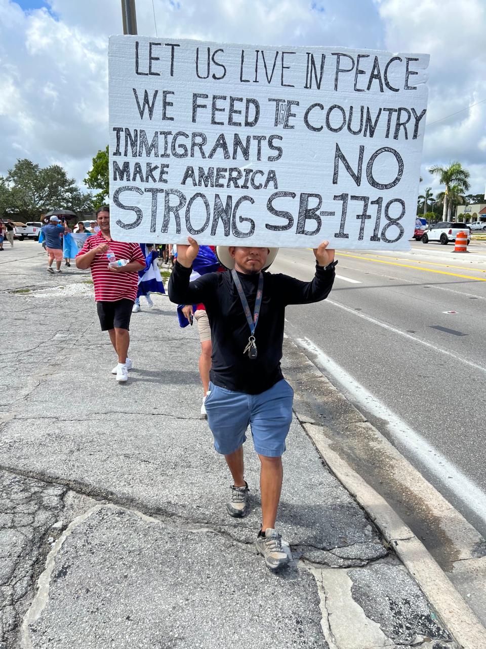 Valentina, who declined to provide his last name, led a march along U.S. 41 in Fort Myers from Edison Mall to downtown Fort Myers. He is an immigrant with two immigrant kids. He along with several others in the protest shared the event on social media and he “thanks God that so many people came out.” He opposed a newly enacted anti-immigrant law and wants to work in peace.