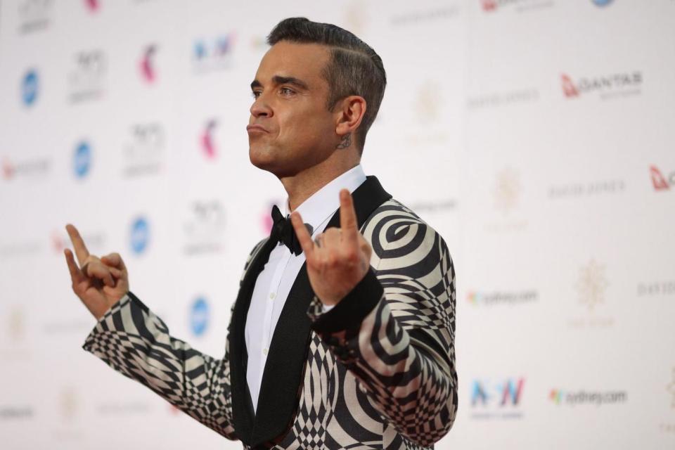 Robbie Williams: The Angels singer is locked in a planning battle with Jimmy Page (Getty Images file photo)