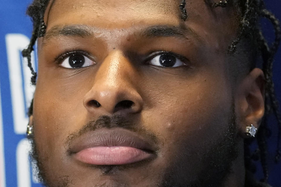 Bronny James listens to reporters during the 2024 NBA basketball Draft Combine in Chicago, Tuesday, May 14, 2024. (AP Photo/Nam Y. Huh)