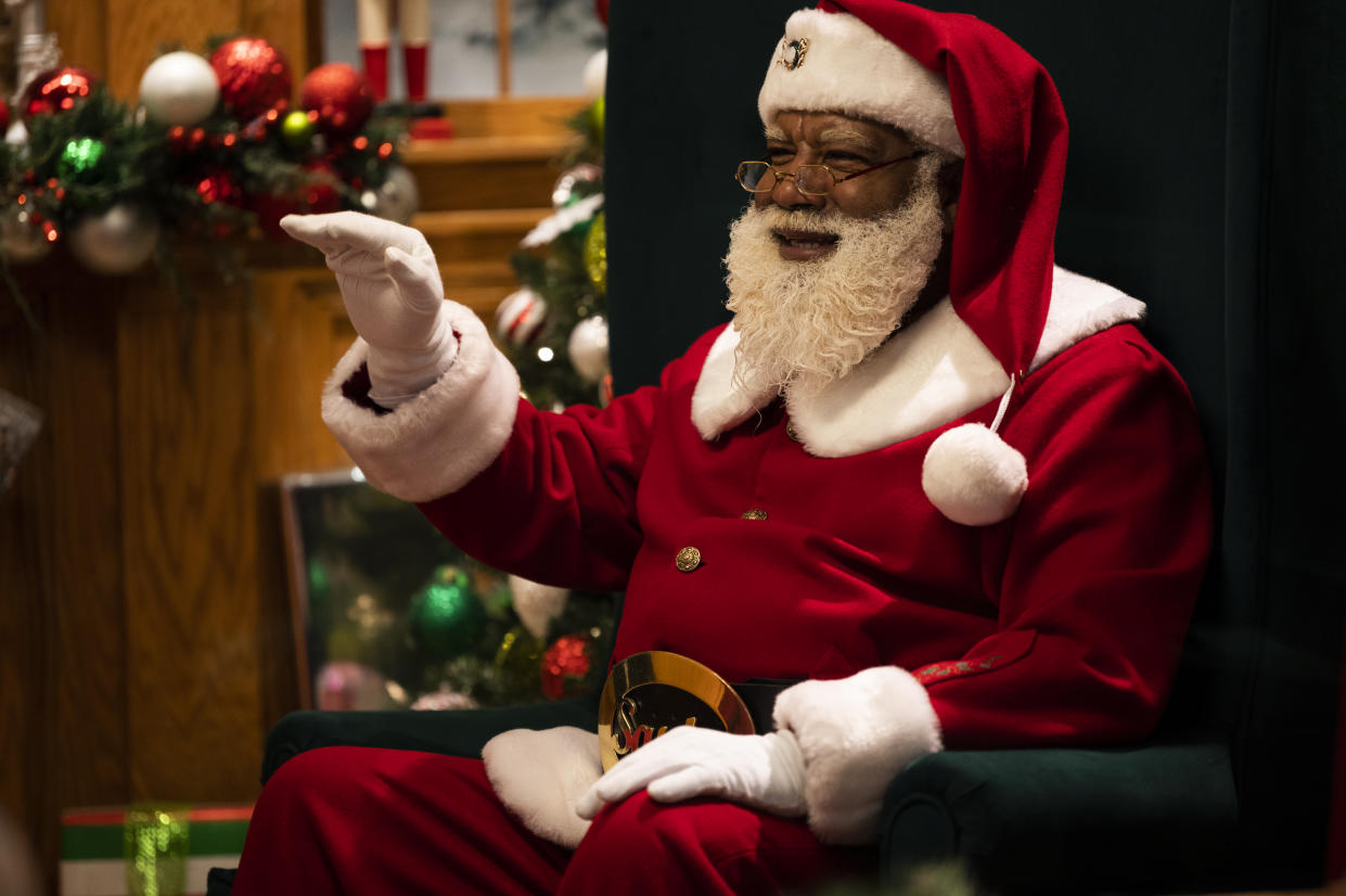 Santa Larry, whose presence sparked controversy when he first appeared at the Mall of America's Santa Experience, is seen here speaking with a virtual visitor in November.  (Photo: Stephen Maturen/Getty Images)