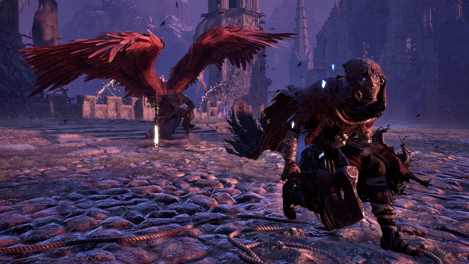 A pyromancer from Lords of the Fallen crouches in front of a recently-slain boss.