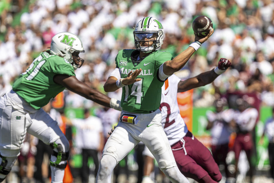 Marshall quarterback Cam Fancher makes a throw as the Herd takes on Virginia Tech during an NCAA college football game, Saturday, Sept. 23, 2023, at Joan C. Edwards Stadium in Huntington, W.Va. (Sholten Singer/The Herald-Dispatch via AP)