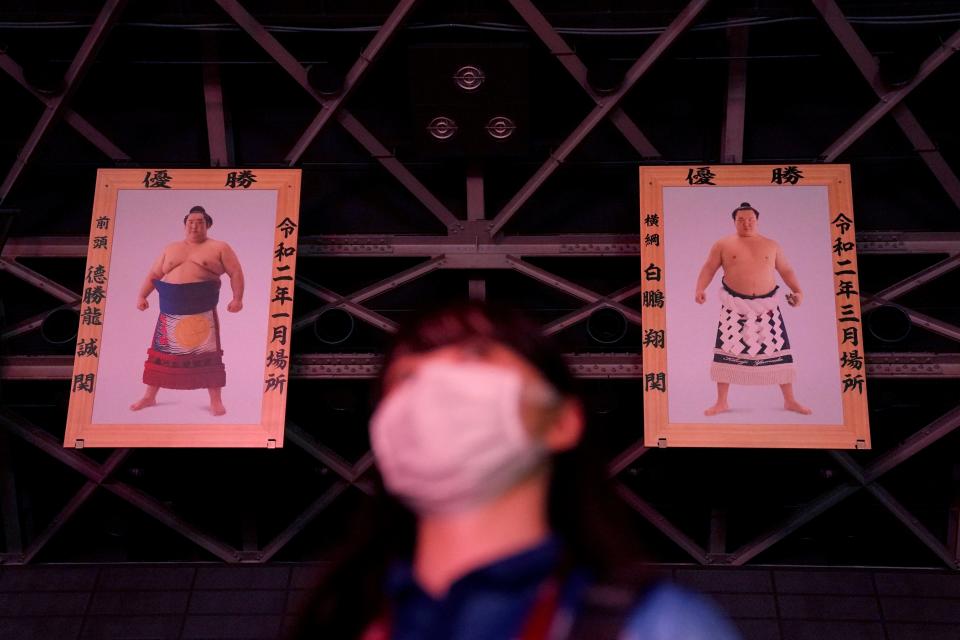 Pictures of famous sumo wrestlers hang from the rafters of Kokugikan Arena, mainly used for sumo wrestling tournaments but where boxing will take place during the Tokyo Olympics.