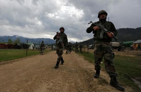 Indian army soldiers patrol inside their army base after it was attacked by suspected separatist militants in Panzgam in Kashmir's Kupwara district, April 27, 2017. REUTERS/Danish Ismail