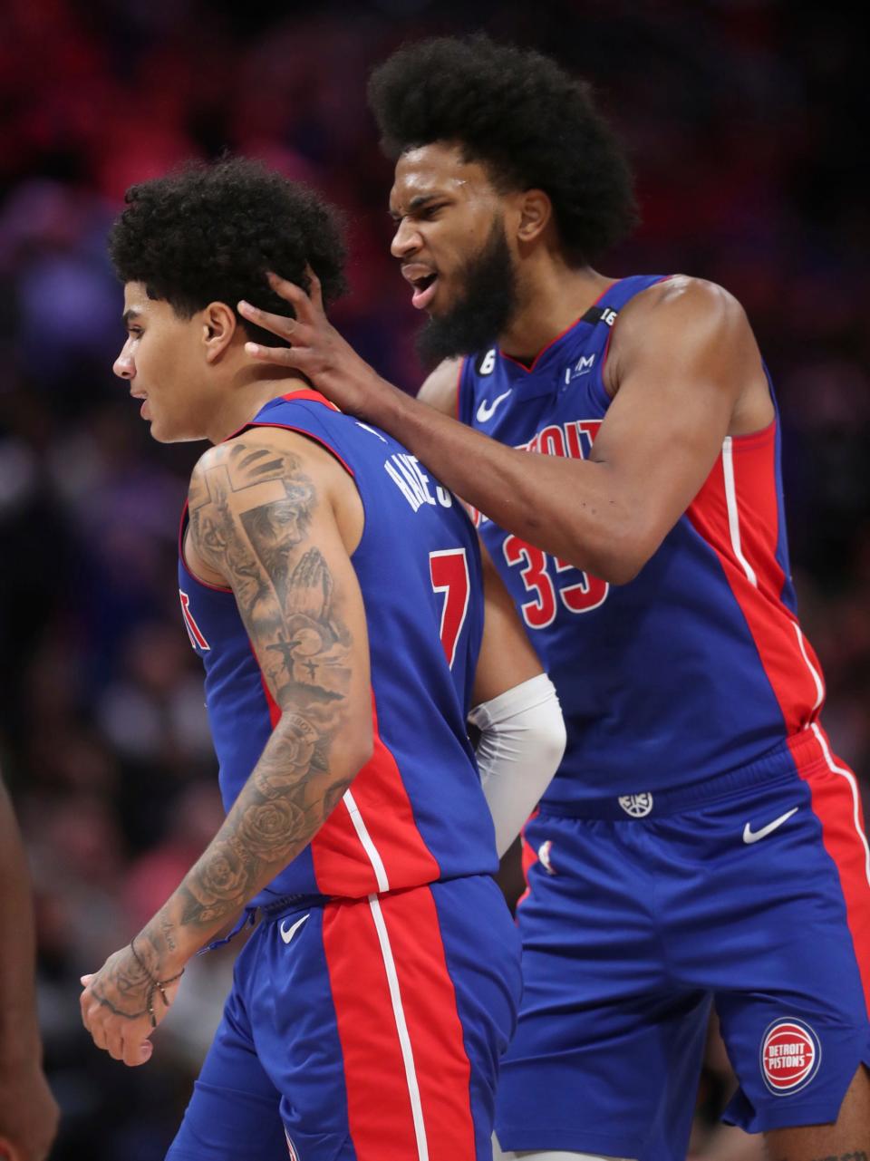 Detroit Pistons forward Marvin Bagley III (35) congratulates guard Killian Hayes (7) after his overtime 3-pointer against the Dallas Mavericks at Little Caesars Arena in Detroit on Thursday, Dec. 1, 2022.