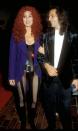 <p>In a black corset, purple blazer, and no pants while out in L.A. with boyfriend Rob Camilletti.</p>