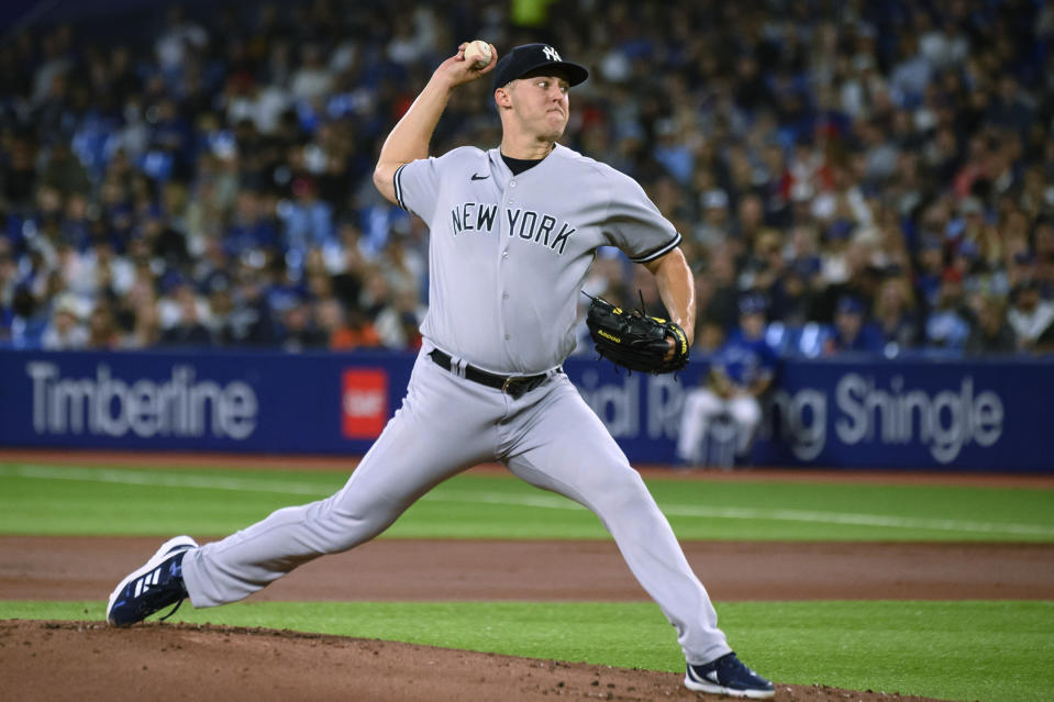 New York Yankees starting pitcher Jameson Taillon throws to a Toronto Blue Jays batter during the first inning of a baseball game Tuesday, Sept. 27, 2022, in Toronto. (Christopher Katsarov/The Canadian Press via AP)