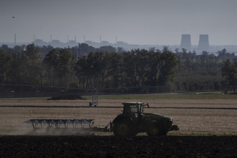 Zaporizhzhia nuclear power plant is seen from around twenty kilometers away in an area in the Dnipropetrovsk region, Ukraine, Monday, Oct. 17, 2022. (AP Photo/Leo Correa)