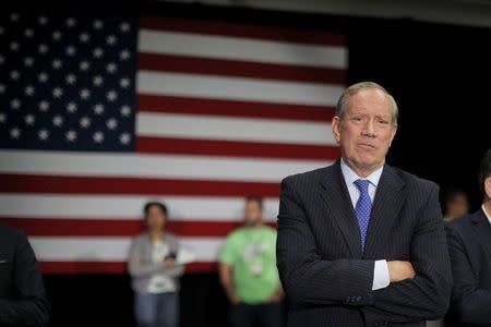 U.S. Republican presidential candidate George Pataki listens as he is introduced at the No Labels Problem Solver Convention in Manchester, New Hampshire October 12, 2015. REUTERS/Brian Snyder