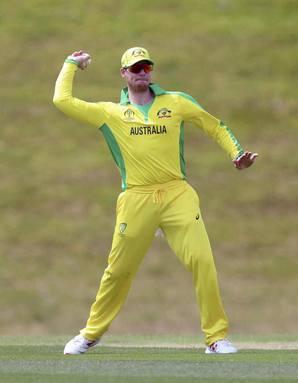 Australia's Steve Smith prepares to throw the ball during the World Cup warm-up match at the Nursery Ground, Southampton. (Andrew Matthews/PA via AP)