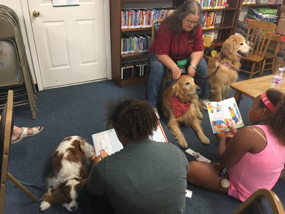 In 2018, children were asked to read to therapy dogs in a themed program held at the Rasey Memorial Library in Luna Pier.