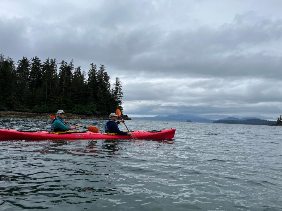 Two people on a kayak 