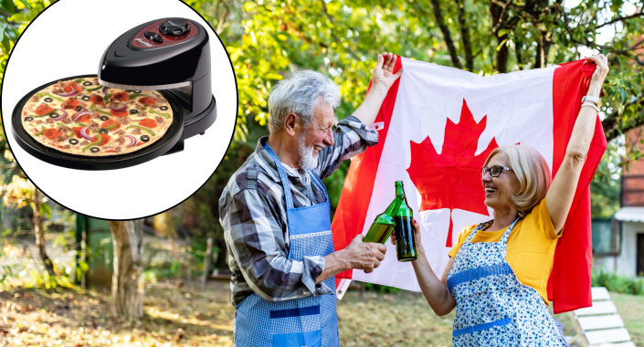 Canada Day, pizza oven, senior couple holding up canada flag drinking beer outside while barbecuing, rotating pizza oven with pizza 