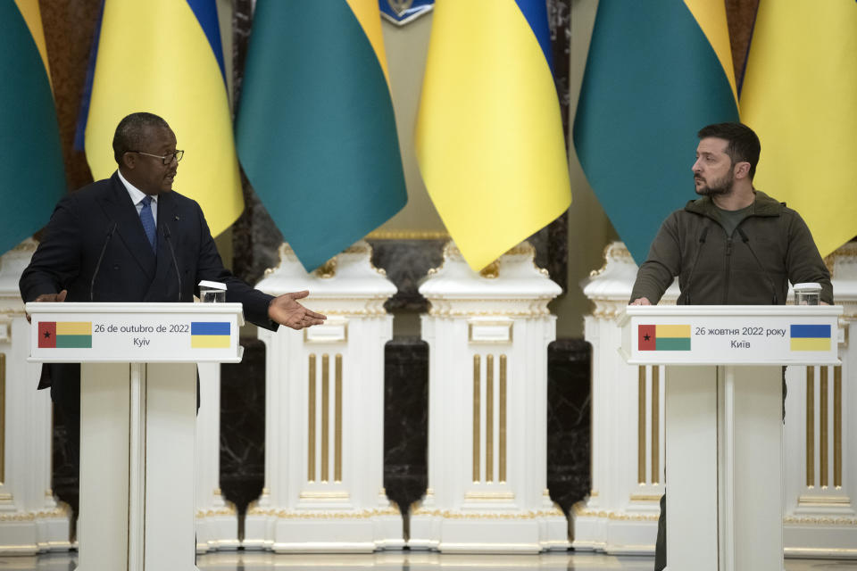 Ukrainian President Volodymyr Zelenskyy, right, and President of Guinea-Bissau Umaro Sissoco Embalo attend a joint news conference during their meeting in Kyiv, Ukraine, Wednesday, Oct. 26, 2022. (AP Photo/Andrew Kravchenko)