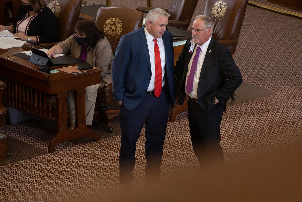 Former state Reps. Bryan Slaton, Kyle Biedermann on the House floor at the state Capitol in Austin on April 26, 2021.