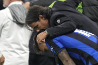 Inter Milan's head coach Simone Inzaghi, top, and Inter Milan's Lautaro Martinez celebrate at the end of the Champions League semifinal second leg soccer match between Inter Milan and AC Milan at the San Siro stadium in Milan, Italy, Tuesday, May 16, 2023. (AP Photo/Luca Bruno)