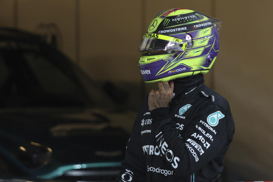 Mercedes driver Lewis Hamilton of Britain reacts after qualifying session ahead of the Abu Dhabi Formula One Grand Prix at the Yas Marina Circuit, Abu Dhabi, UAE, Saturday, Nov. 25, 2023. (Ali Haider/Pool via AP)
