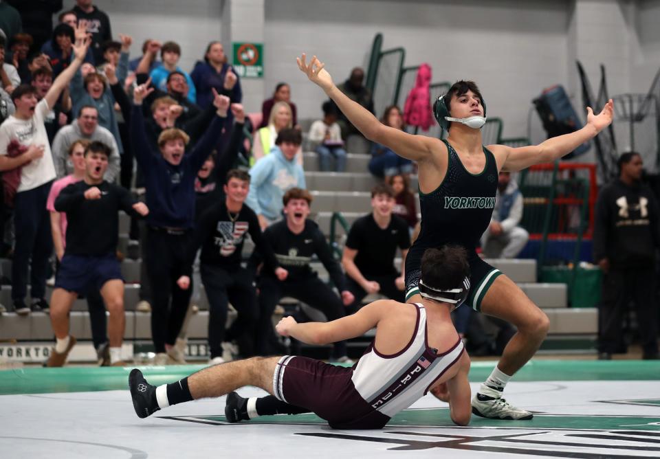 Nick Bucello from Yorktown and Abass Mansour from Ossining wrestle in the 138-pound weight class during the Section 1 Division I Dual Meet Tournament at Yorktown High School Dec. 21, 2023. Bucello won the match.