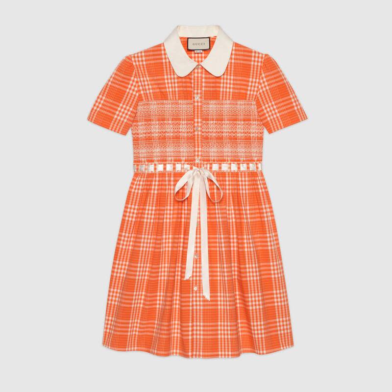 The orange tartan design features a satin bow detail. (Gucci)