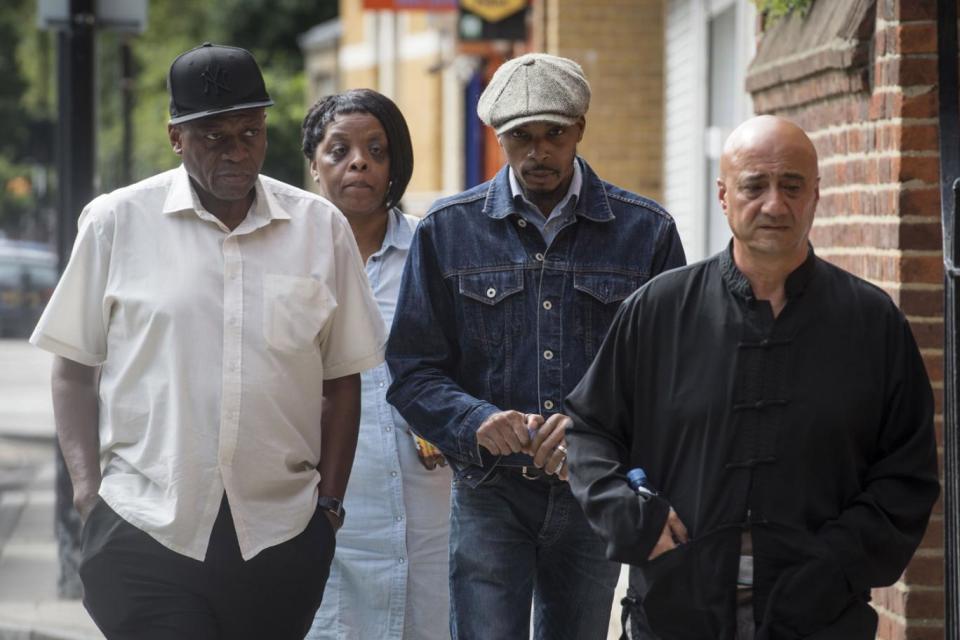 The family of Rashan Charles, including his father Esa (second right) arrive at Poplar Coronerís Court, in east London (Lauren Hurley/PA)