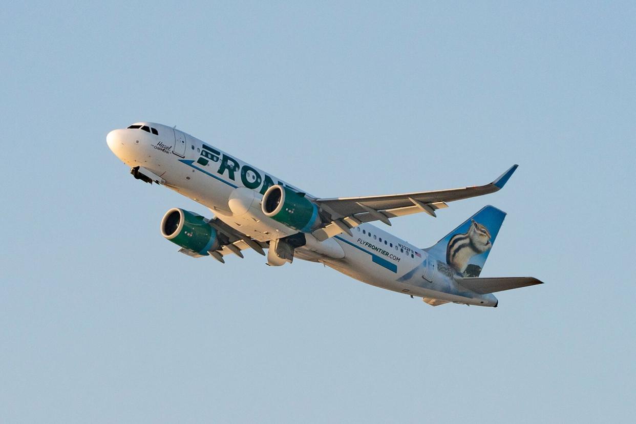 Frontier Airlines Airbus A320 takes off from LAX Los Angeles, California.