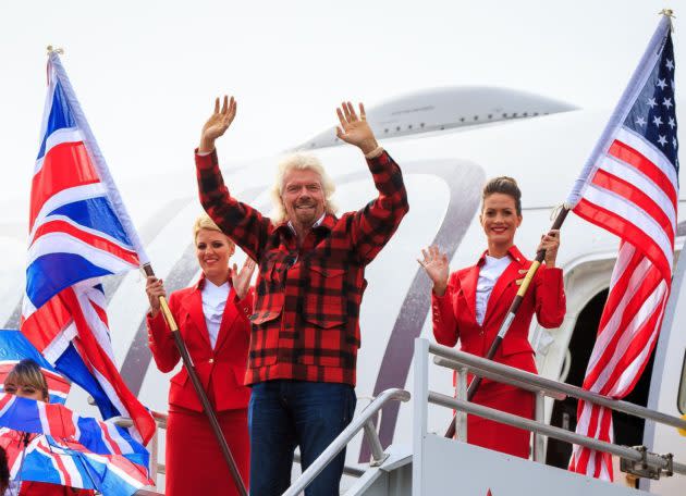 Virgin Atlantic’s founder, Richard Branson, demonstrates that he knows how to make an entrance at Sea-Tac International Airport. (Virgin Atlantic Photo via Twitter)