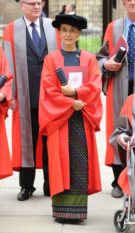 Burmese pro-democracy leader Aung San Suu Kyi receives her honorary degree along with seven other distinguished figures at the Encaenia ceremony held at the Sheldonian Theatre in Oxford on June 20, 2012. On April 1, 2012, Aung San Suu Kyi won a seat in Parliament less than two years after being freed from nearly two decades of house arrest. File Photo by Paul Treadway/UPI