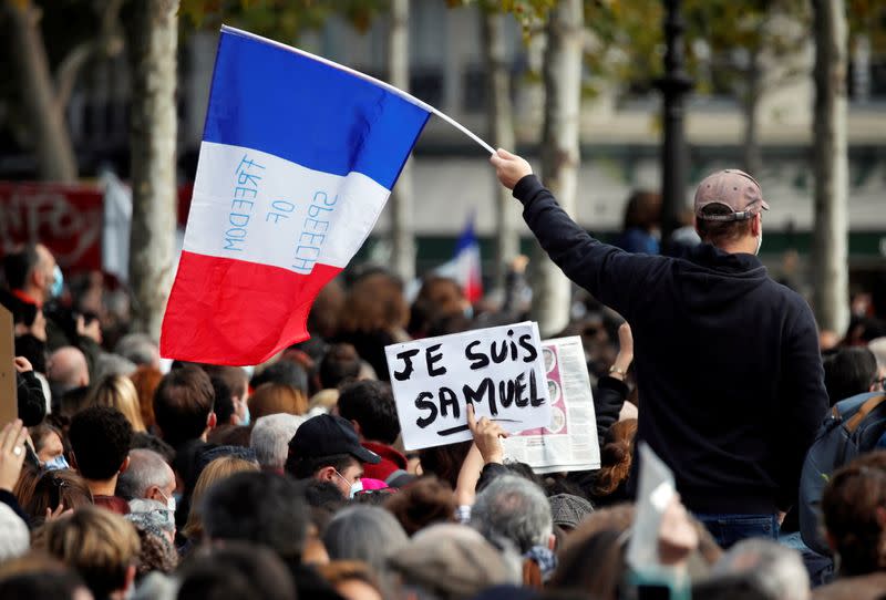 People pay tribute to beheaded teacher Samuel Paty in Paris