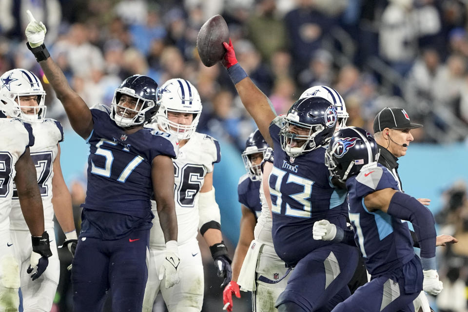 Tennessee Titans defensive tackle Teair Tart (93) reacts to a fumble recovery against the Dallas Cowboys during the first half of an NFL football game, Thursday, Dec. 29, 2022, in Nashville, Tenn. (AP Photo/Chris Carlson)