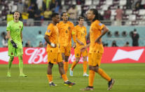 Virgil van Dijk of the Netherlands, middle, with teammates at the end of the World Cup group A soccer match between Netherlands and Ecuador, at the Khalifa International Stadium in Doha, Qatar, Friday, Nov. 25, 2022. (AP Photo/Themba Hadebe)