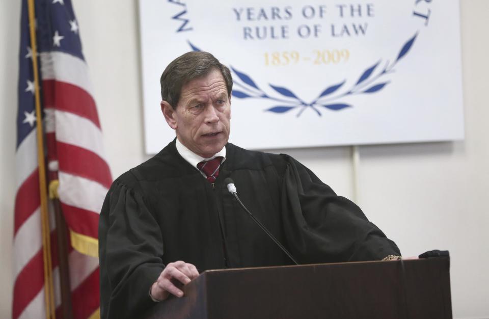 Judge Jeffrey Locke greets the jury pool, Tuesday Feb. 14, 2017, in Suffolk Superior Court in Boston. Jury selection begins in the double murder trial of former New England Patriots tight end Aaron Hernandez. (Pat Greenhouse/Boston Globe via AP, Pool)