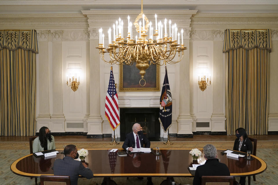 President Joe Biden participates in a roundtable discussion on a coronavirus relief package in the State Dining Room of the White House in Washington, Friday, March 5, 2021. (AP Photo/Patrick Semansky)