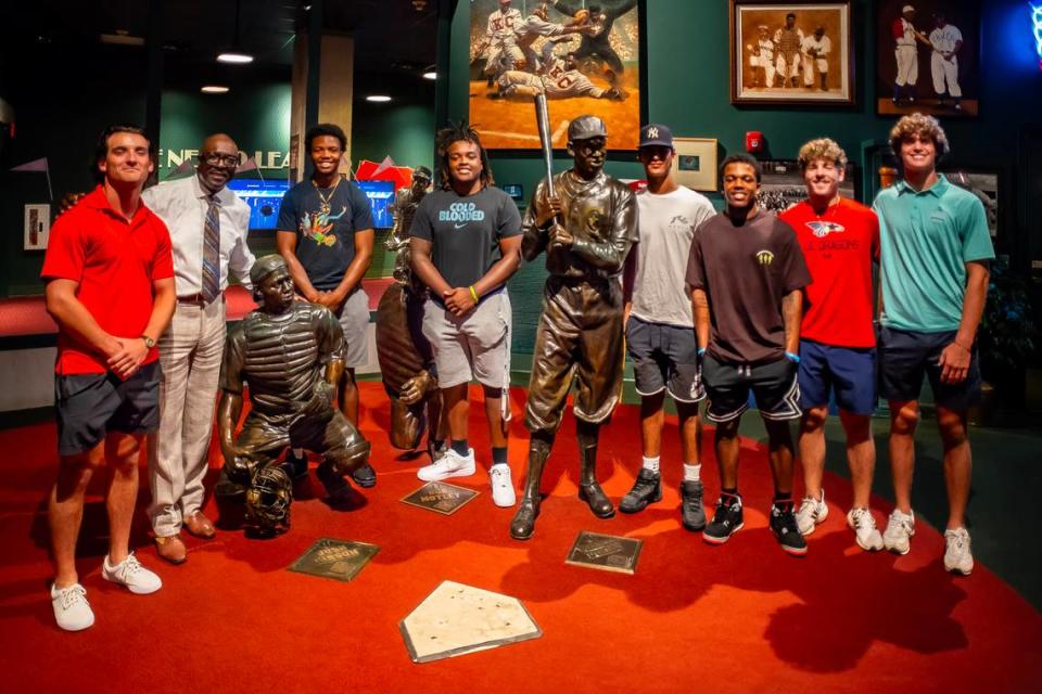 Negro Leagues Baseball Museum president Bob Kendrick poses with Ban Johnson Collegiate League players after a tour of the Field of Legends on Wednesday, July 19, 2023. Contributed Photo/Chad Combs