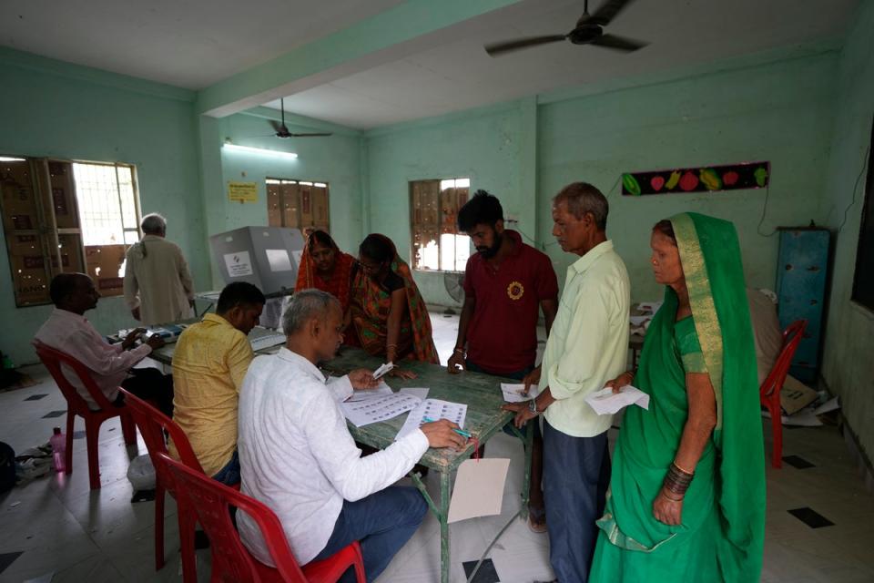 Voters wait for their turn to cast their vote during the seventh and final phase of voting of the national election in Varanasi , India, Saturday, 1 June  2024 (AP)