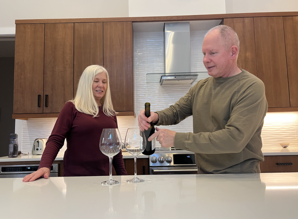 Martha and Ken Williams in their new kitchen in the new net-zero Array development in Orange County.