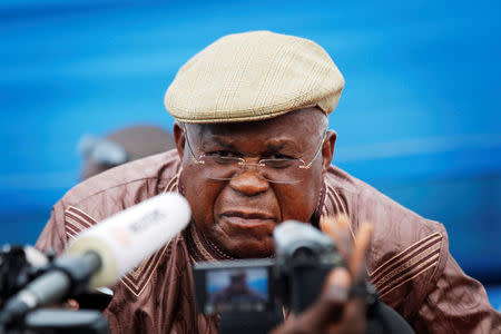 FILE PHOTO: Opposition leader Etienne Tshisekedi speaks to the media as he and his entourage are blocked by police outside N'Djili airport in Democratic Republic of Congo's capital Kinshasa November 26, 2011. REUTERS/Finbarr O'Reilly/File Photo