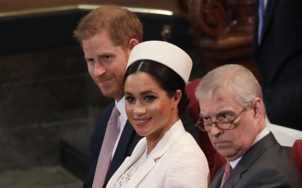 Harry, Meghan and Andrew at the Commonwealth Day Service in 2019, before they respectively stepped back from being working royals. (Getty Images)