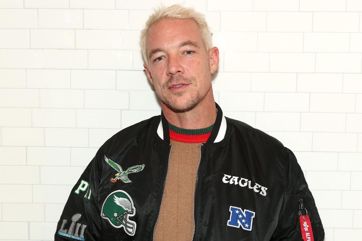 Diplo arrives as Gucci & GQ Sports: Jalen Ramsey & GQ's Will Welch invite you to celebrate A Hero's Journey at Ziggy's Pizza on February 10, 2023 in Phoenix, Arizona.