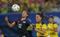2016 Rio Olympics - Soccer - Preliminary - Women's First Round - Group G Colombia v USA - Amazonia Stadium - Manaus, Brazil - 09/08/2016. Nataly Arias (COL) of Colombia and Christen Press (USA) of USA in action. REUTERS/Bruno Kelly
