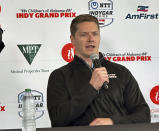 Reigning Indianapolis 500 champion Josef Newgarden talks in Birmingham, Ala., Friday, April 26, 2024, about his recent disqualification in the season-opening IndyCar auto race. Newgarden is preparing for Sunday's race at Birmingham's Barber Motorsports Park. (AP Photo/John Zenor)