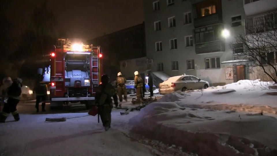 Pictured are emergency services at the scene of a fire in the Russian city of Yekaterinburg.