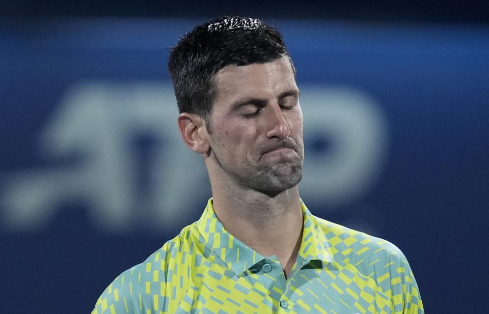 Serbia's Novak Djokovic reacts after he lost their semi final match against Daniil Medvedev at the Dubai Duty Free Tennis Championships in Dubai, United Arab Emirates, Friday, March 2, 2023. (AP Photo/Kamran Jebreili)