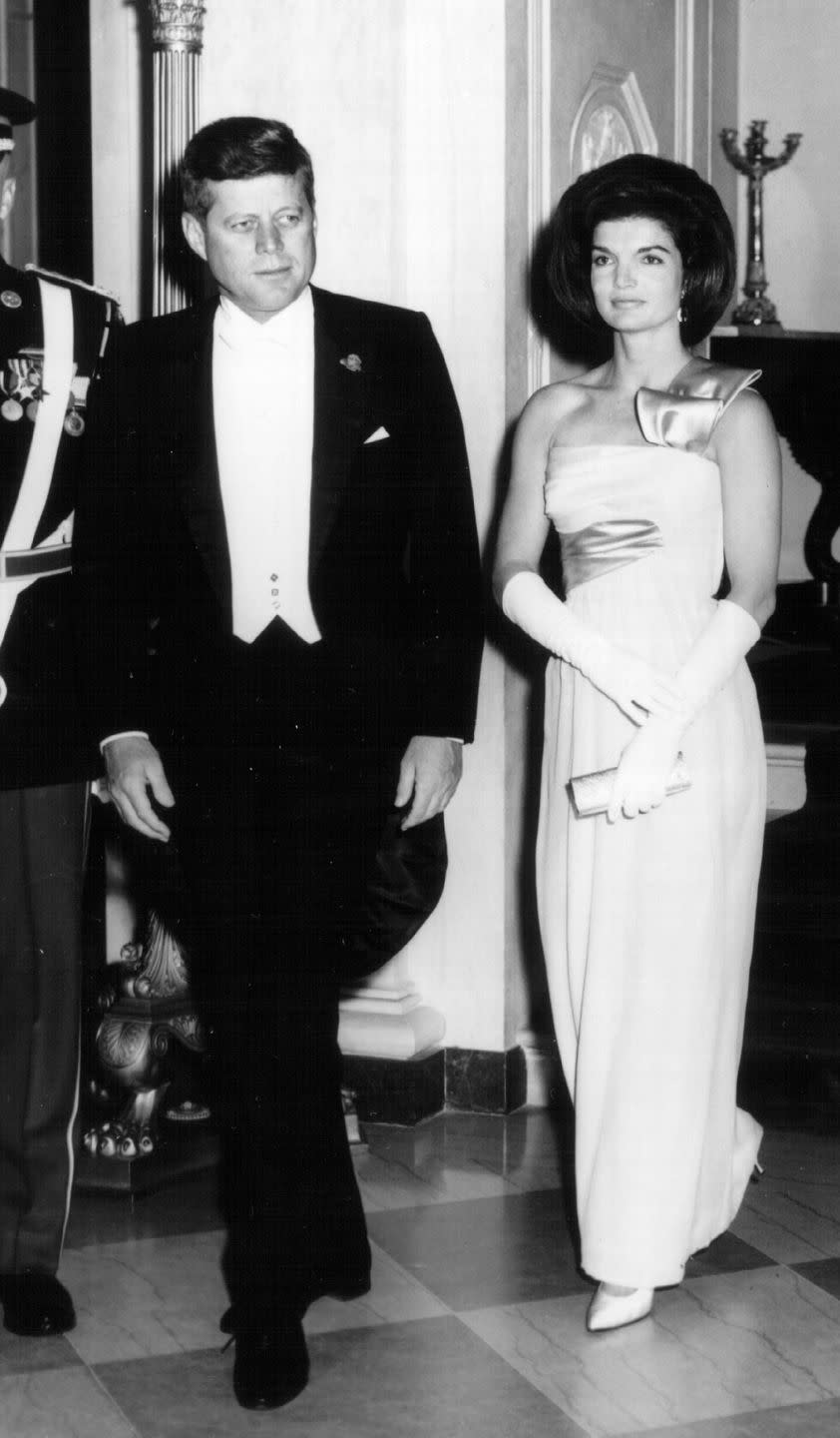 <p>President John F. Kennedy and First Lady Jackie Kennedy attend a White House Ceremony in Washington DC. </p>