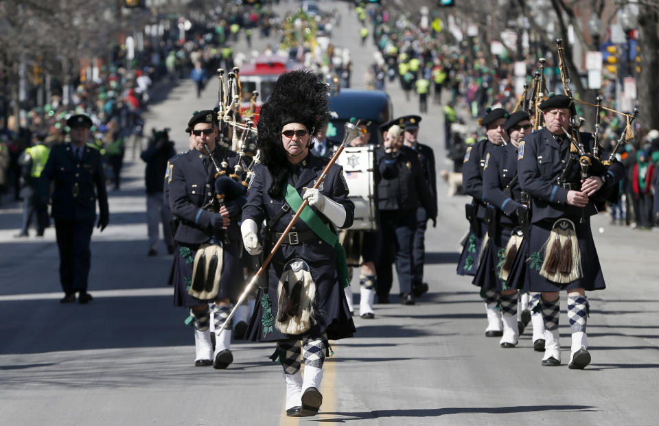 The Boston Police Gaelic Column marches in the annual St. Patrick's Day parade in the South Boston neighborhood of Boston, Sunday, March 16, 2014. (AP Photo/Michael Dwyer)