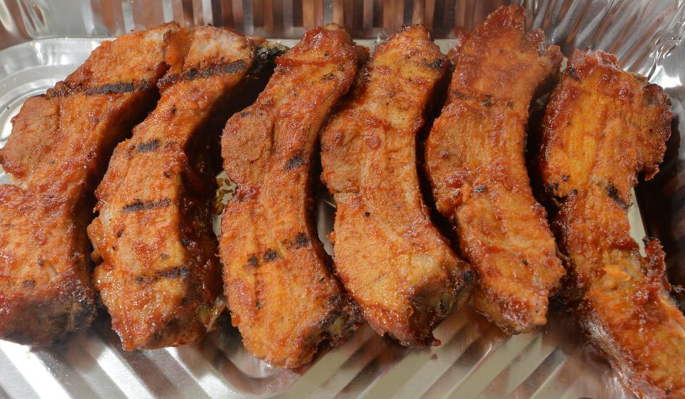 An order of baby-back ribs was going out the door quickly at Skinny Nate's BBQ in September during a soft opening in Albion.