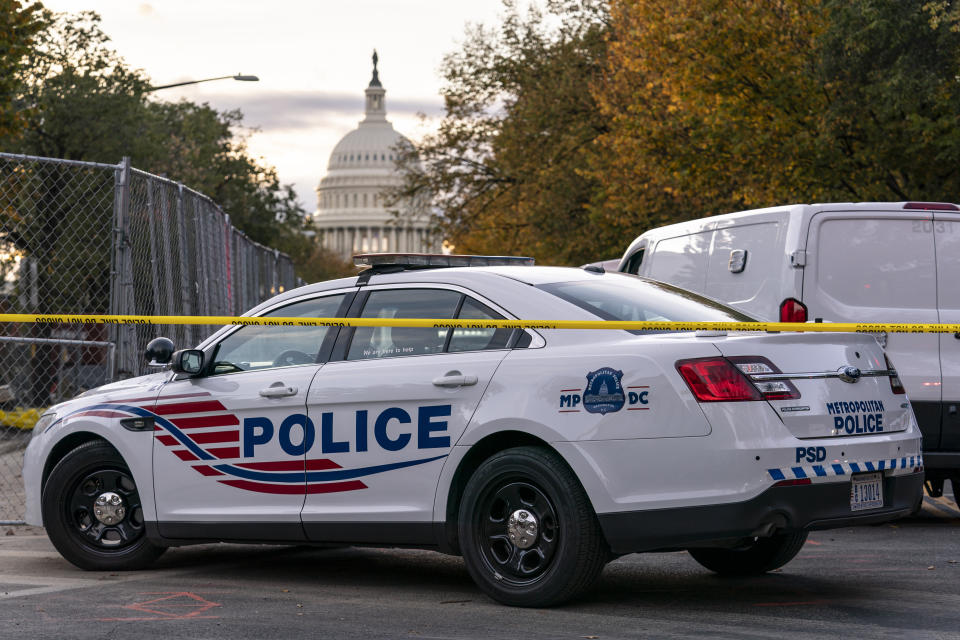 FILE - Washington Metropolitan Police investigate near the Supreme Court and Capitol after reports of a suspicious vehicle in which two men and a woman were detained with guns, in Washington, Oct. 19, 2022. The head of the D.C. Council said Monday, March 6, 2023, that he is withdrawing the capital city’s new criminal code from consideration, just before a U.S. Senate vote that seemed likely to overturn the measure. But it's unclear if the action will prevent the vote or spare President Joe Biden a politically charged decision on whether to endorse the congressional action. (AP Photo/J. Scott Applewhite, File)