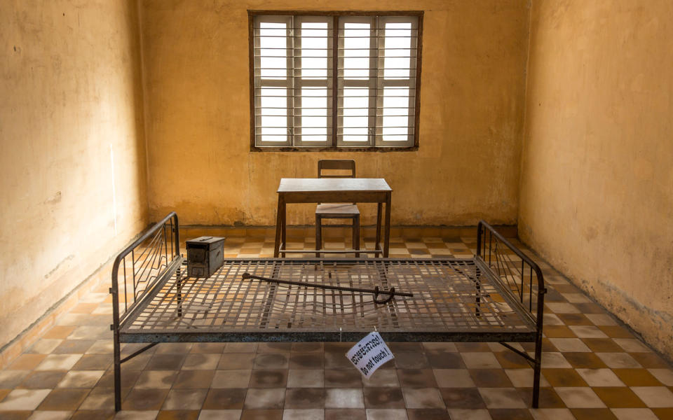 <p>During Cambodia’s long, bloody war, the Khmer Rouge turned a former Phnom Penh high school into a prison where an estimated 20,000 people were tortured or killed. At Pol Pot’s secret prison, captives were tortured into confessing to crimes they didn’t commit or forced to name associates. Now the prison has a third life as the <a rel="nofollow noopener" href="http://www.tuolslenggenocidemuseum.com/" target="_blank" data-ylk="slk:Tuol Sleng Genocide Museum;elm:context_link;itc:0;sec:content-canvas" class="link ">Tuol Sleng Genocide Museum</a>, where visitors can pay respects to the deceased. The museum reminds visitors to learn from the past—and the ghosts that are said to haunt the space help with that mission.</p>