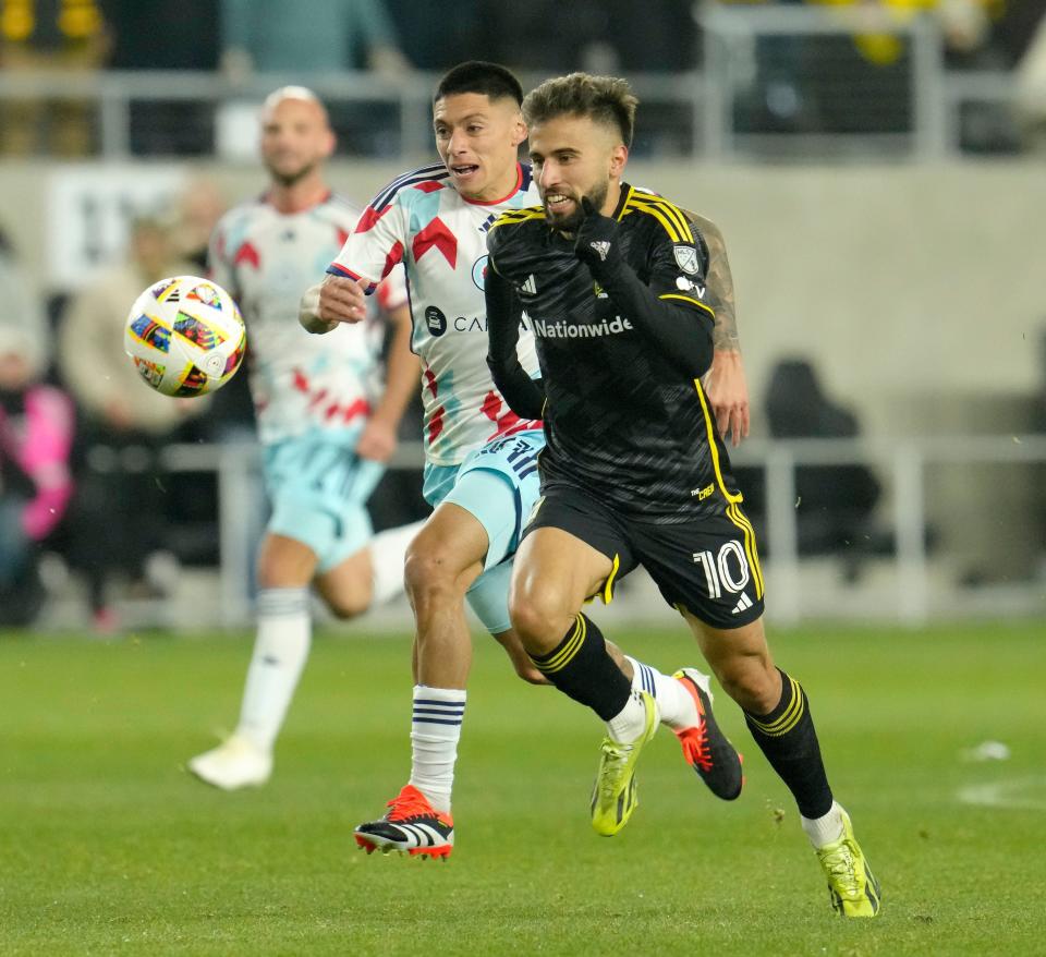 March 9, 2024; Columbus, Ohio, USA; 
Columbus Crew forward Diego Rossi (10) is pursued by Chicago Fire midfielder Federico Navarro (31) during the second half of a soccer match Saturday at Lower.com Field. The Columbus Crew beat the Chicago Fire 2-1.